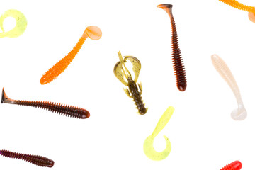 Multicolored silicone baits isolated on white background. Studio photo.