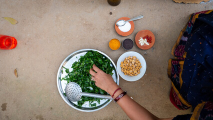 Indian women cooking food in the village