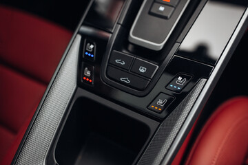 Close up shot of modern car central console with seat and ventilation heating controls