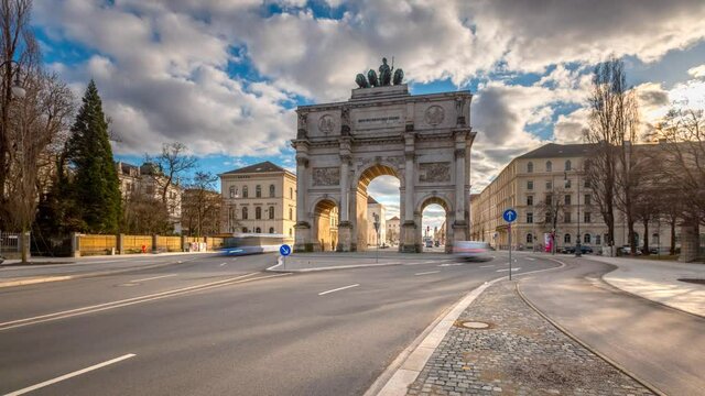 The Siegestor Victory Arch in Munich City time lapse Hyperlapse Video in 4K, Munich Bavaria, Germany. Munich traffic street cars urban scene.