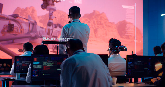 Team Of Operators Controlling Mars Rover Remotely