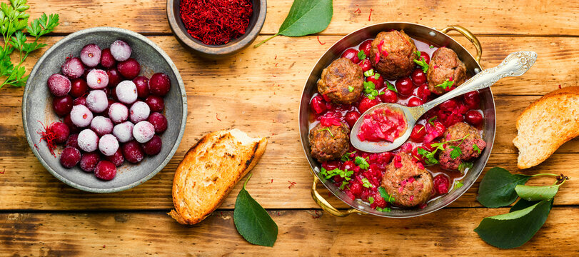 Lamb meatballs in cherry sauce