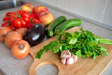 Various fruits and vegetables on kitchen desk