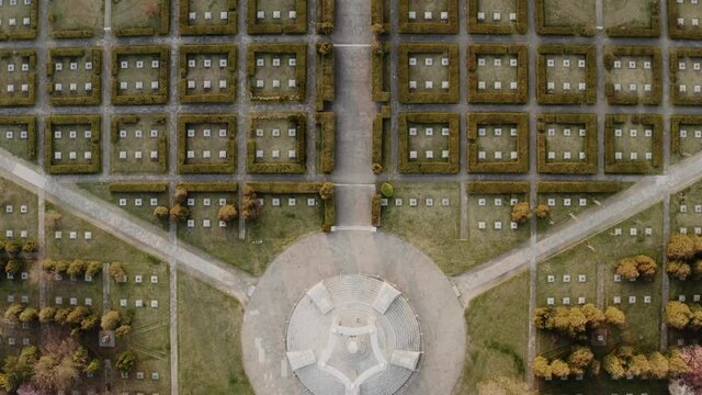 Old cemetry drone view. Aerial shot of an outside memorial, fall city landscape. Forgotten, mysterious place in the suburbs.