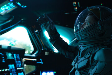 Portrait of Caucasian male astronaut inside spaceship cockpit. Sci-fi space exploration concept © supamotion