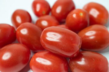 Sida Tomatoes on white background.