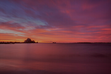 Obraz premium Beautiful, colourful ,autumn sunrise over Picnic Rocks. Mount William National Park. Part of the Bay of Fires Conservation Area. North Eastern Tasmania, Australia.
