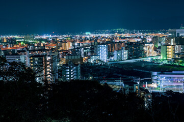 日本の地方都市、福岡市愛宕神社から望む夜景の美しいビル街の灯りと街並み