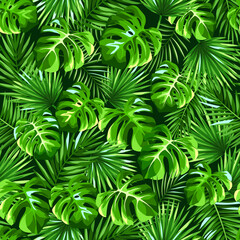 Vector tropical seamless pattern with green monstera and palm leaves.