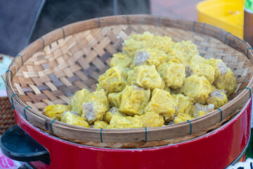Chinese steamed shrimp dimsum in bamboo containers.