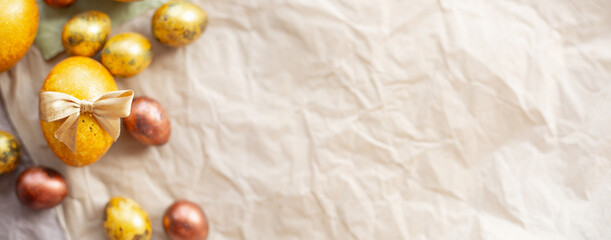 Golden easter eggs on paper