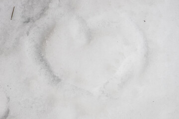 Obraz premium Heart shaped form on snow