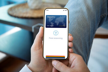 woman hand holding phone with application face scanning id