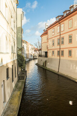 Fototapeta na wymiar Small river crossing Prague