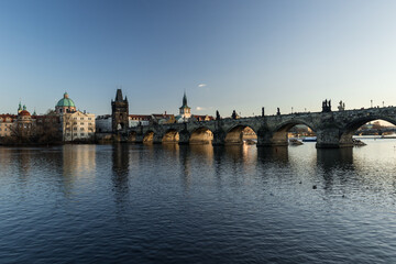 Fototapeta na wymiar Charles Bridge in Prague seen from beside