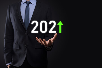 Plan business positive growth in year 2021 concept. Businessman plan and increase of positive indicators in his business, Growing up business concepts.