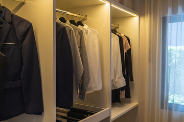 Fototapeta na wymiar modern wardorbe with set of clothes