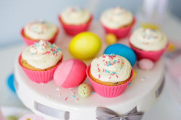 Easter sweets and decorations - cupcakes and painted eggs