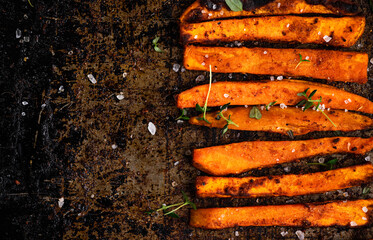 Sweet Potato Homemade Fries Chips with Herbs and Salt. Baked in Owen Potato Chips