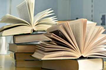 A stack of books on the table.