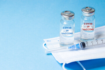 Vaccination against viruses. Vaccinations. Preparation and development of vaccines against viruses. Syringe and ampoules with a vaccine. Scientific research. Copy space.