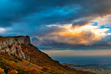sunset over the hills and the sea in crimea on an autumn evening