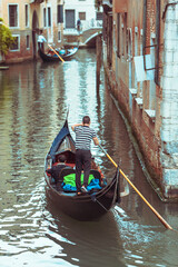 gandolas at venice canals summer time