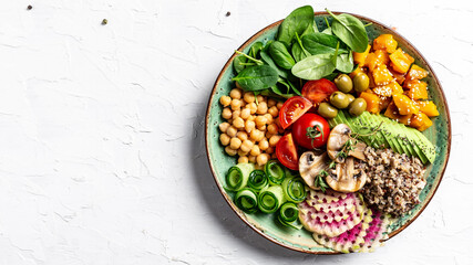 vegan bowl. Avocado, quinoa, sweet potato, tomato, spinach and chickpeas vegetables salad. Buddha Bowl. Long banner format, top view