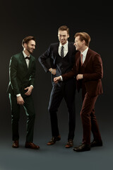 cheerful men in suits