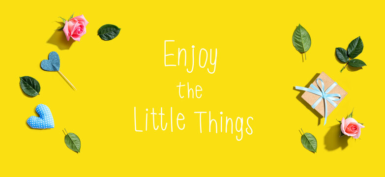 Enjoy the little things message with a small gift box and roses