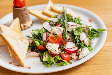 fresh salad with toast and pate