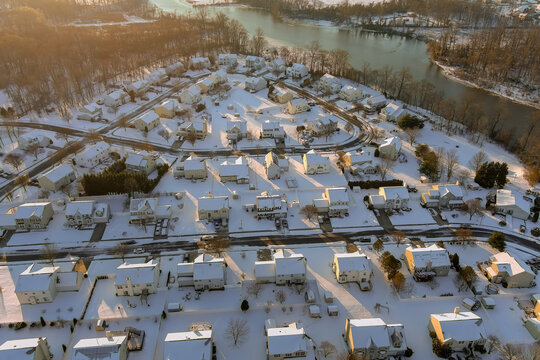 America Small Town Houses And Streets A After The Snowy Day Peaceful Landscape Amazing Winter Snow Scenery In Sunset With River Flowing