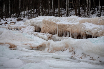  Ice formations at Baltic sea coast. Full of ice winter sea coast in Europe. Natural outdoor seascape with frozen ice formations. Ice covered Baltic sea coast. Frozen ice on a sunny day. Scenic view