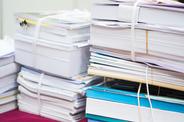 Stack of old documents report about research education document teacher while waiting approve from advisor, Annual Reports document for evaluation in student study