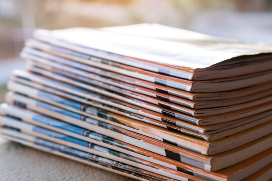 Files Stacking Messy Student Homework Books On Teacher Desk In School. Old Magazines Or Documents Reports On Office