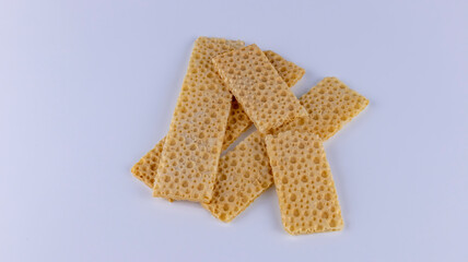 fitness crispbreads lie in a white plate, isolated