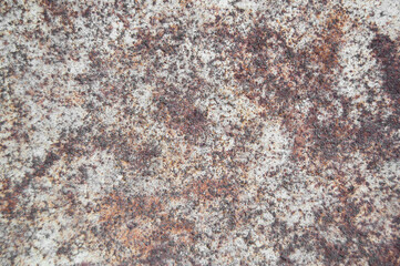 Old cracked paint pattern on rusty background. Peeling grunge material. Damaged metal surface. Scratched plate