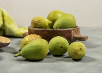 Fresh figs with ingredients on the table.