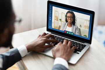 Online Business Meeting. African American Businessman Having Video Conference With Female Partner