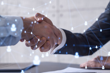Recruitment concept to hiring of a new talented specialists for international company. Handshake to...