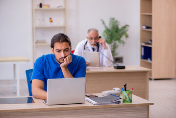 Two doctors working in the clinic