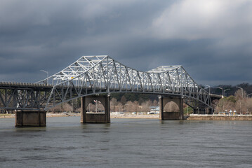 Historic O'Neal Bridge a cantilevered warren truss steel bridge over the Tennessee River with dramatic sky