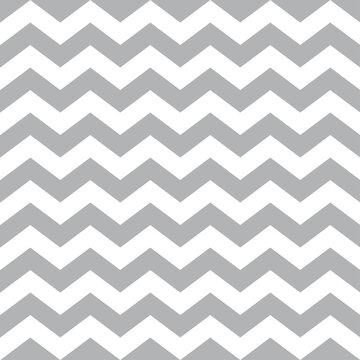 Simple chevron seamless pattern in white and grey. Zig zag stripes design for paper or fabric.