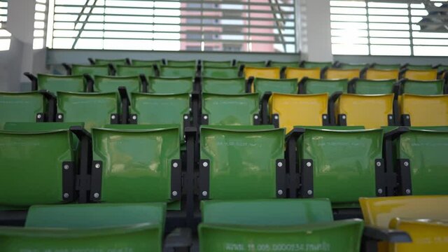 Empty seats in a stadium During the absence of sports events