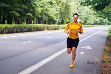 Male jogger running in park