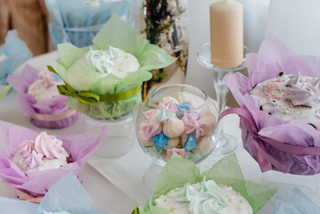 Beautiful Easter cakes on a decorated light table. A light holiday of Easter.