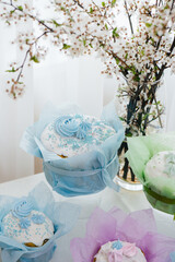 Beautiful Easter cakes on a decorated light table. A light holiday of Easter.