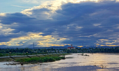 Fototapeta premium clouds over the river