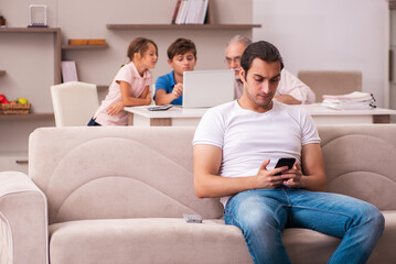 Obraz premium Three generations at home during pandemic