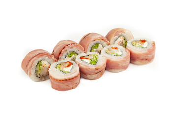 Sushi Roll with bacon and fried sea bass on a white plate, ingredients fried sea bass, cream cheese, bacon, Iceberg salad, flying fish roe, Teriyaki sauce, rice, nori. For the restaurant menu.